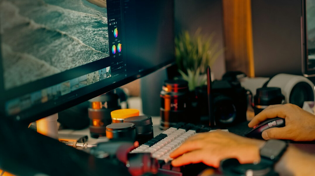 professional video editor at computer